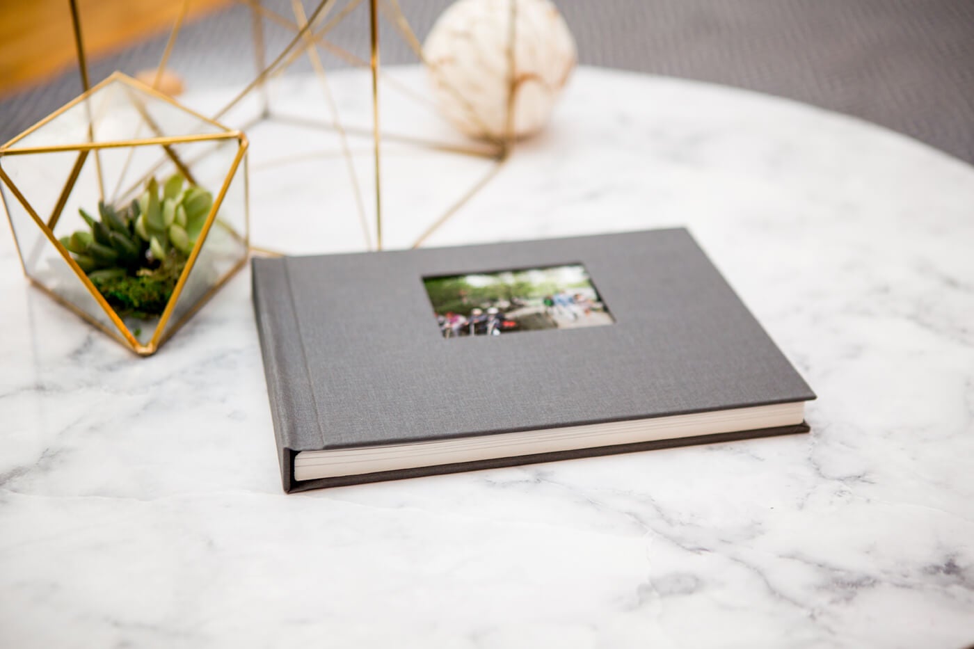 fabric photo book by printique on table