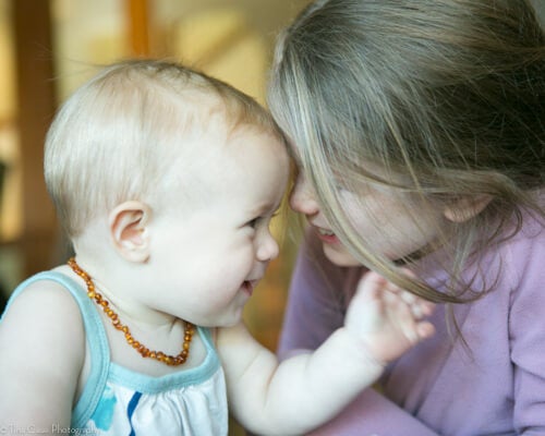 Be sure to capture sibling interaction during baby's first year.