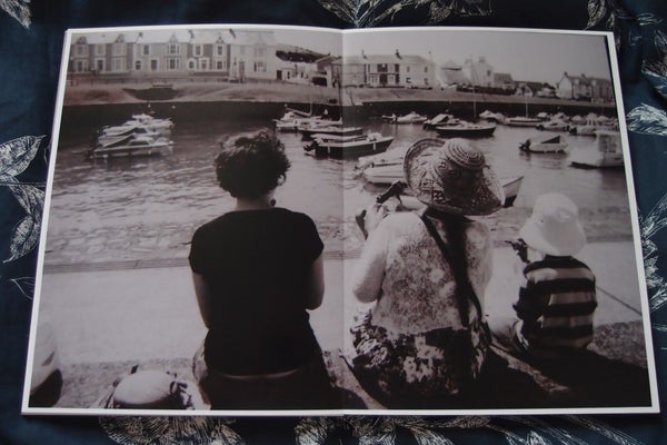 The family gaze at a river.