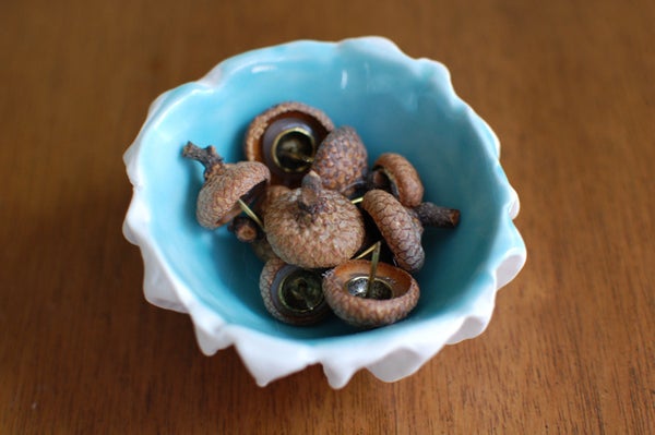 A bowl of DIY push pins.