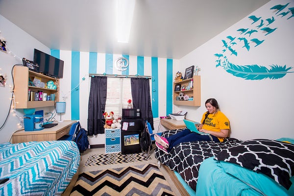 A stylized dorm room.