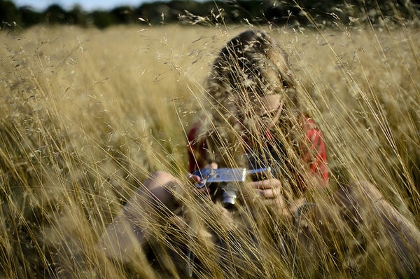 A budding photographer amidst the buds.