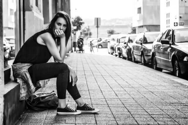 b&w girl on stoop