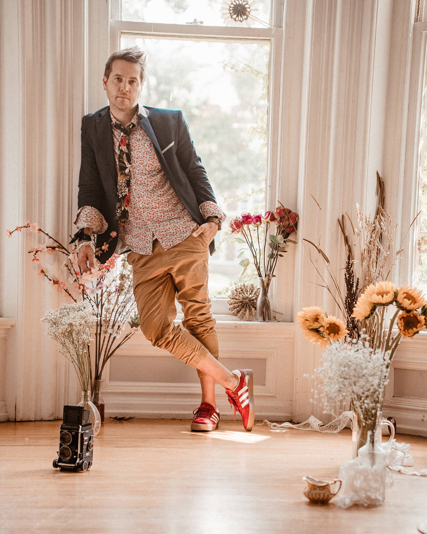 man standing in window