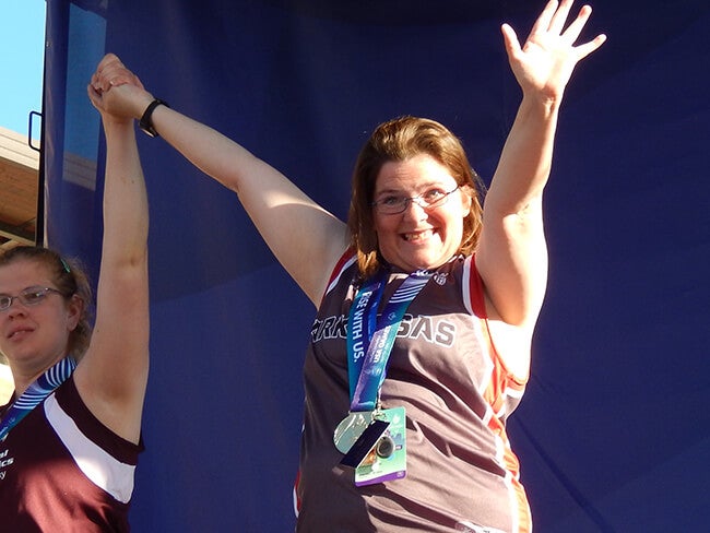 special olympian on podium