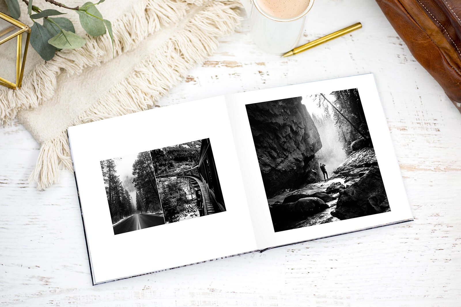 black and white photo book by printique on table