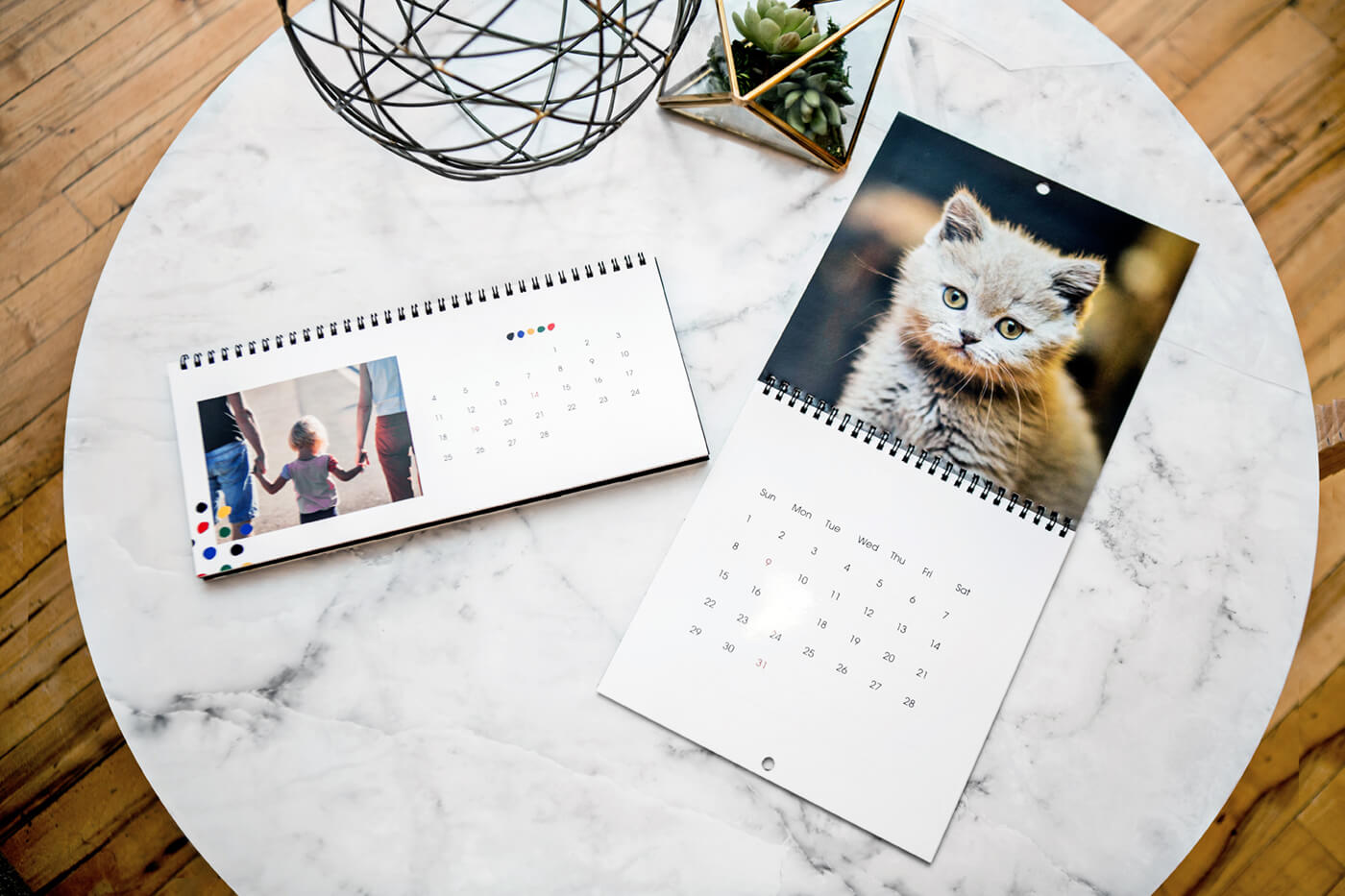 calendars by printique on table