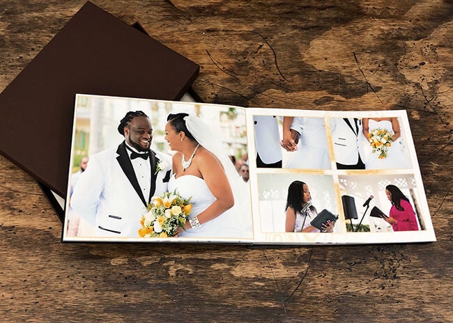 happy couple photos in their wedding album manufactured by printique