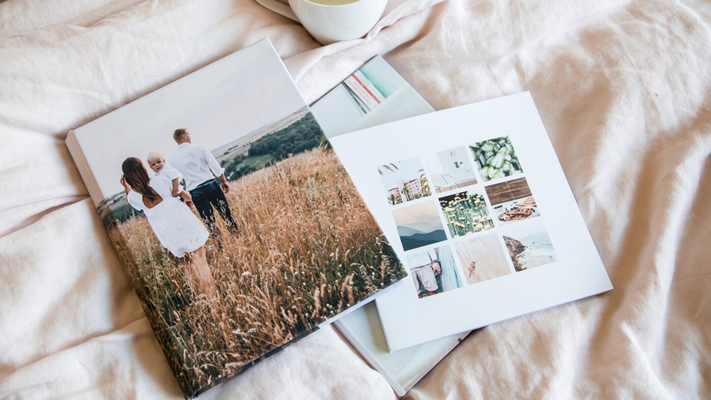 family photo book and album showing family walking photo book by printique