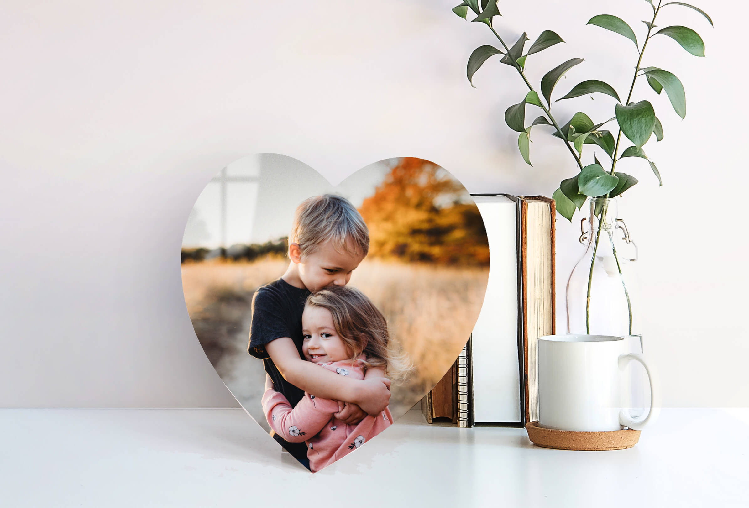 A Heart-Shaped Metal Print Filled With Smiling Faces for All the Grandparents