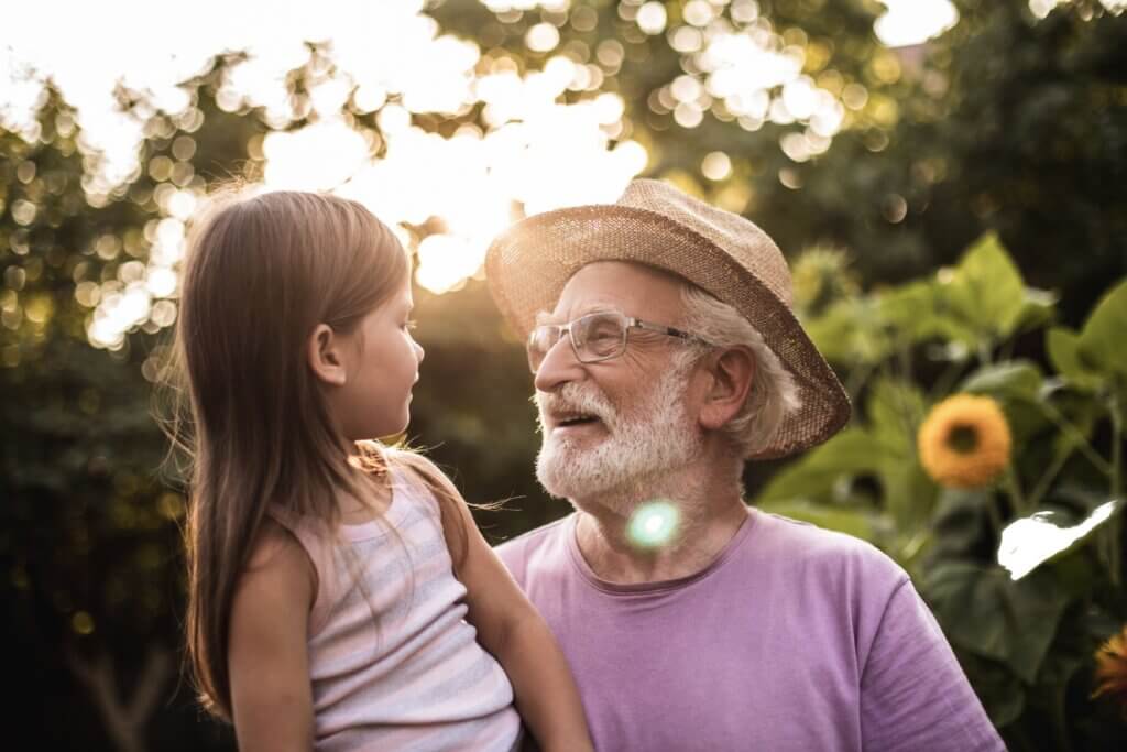 A grandfather is happy to receive a Rosh Hashanah greeting card from his grand daughter.