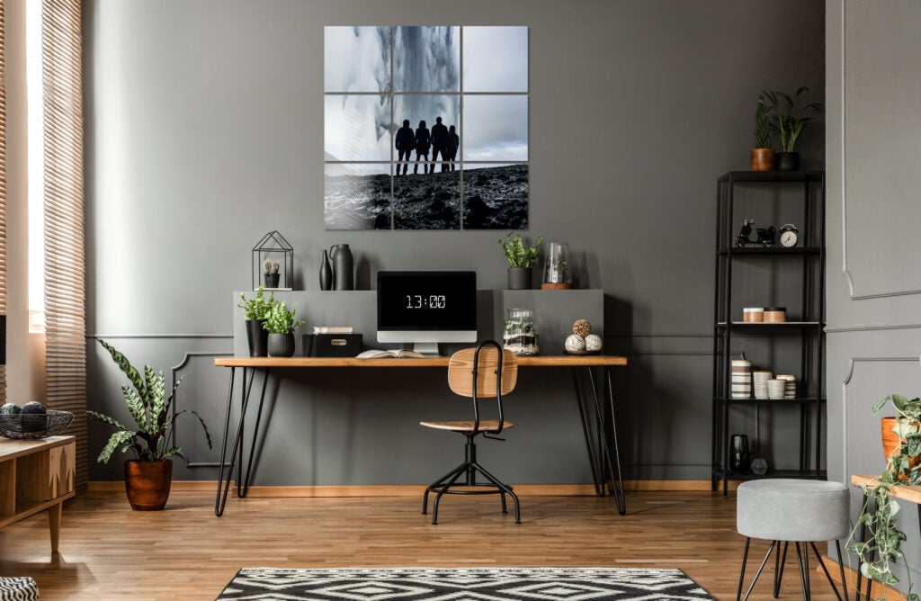 Black and white metal print panels as decoration in an office space.