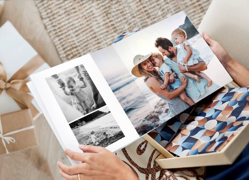 Mom unboxes summer photobook delivery.
