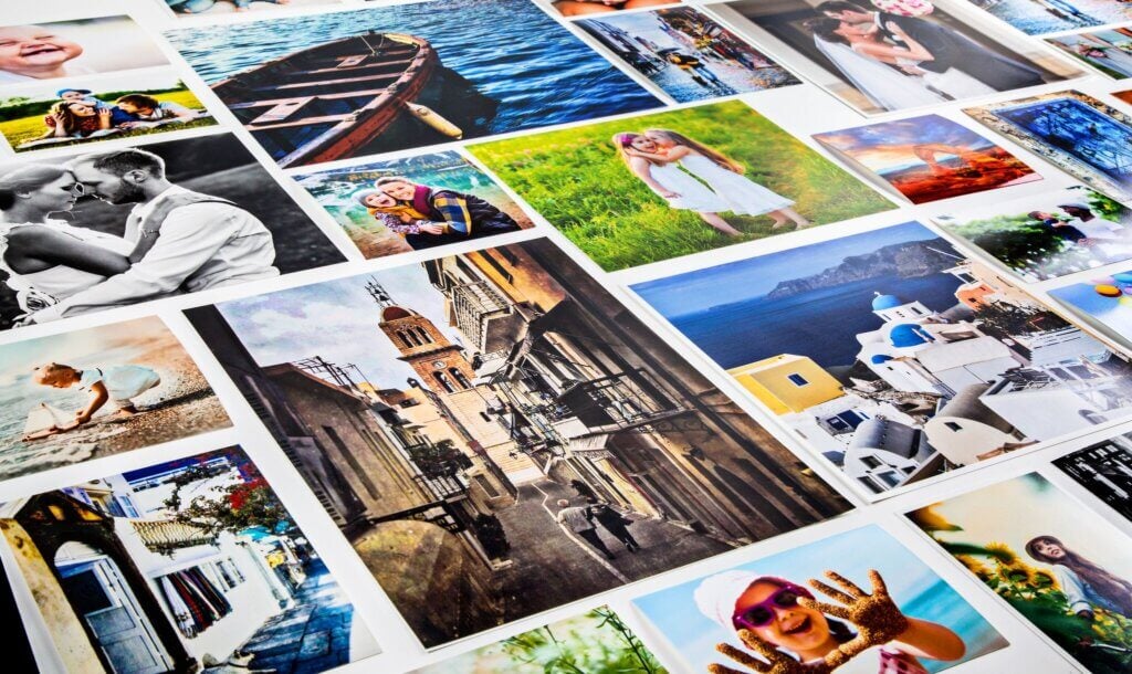 College dorm room wall decorated with classic photo prints