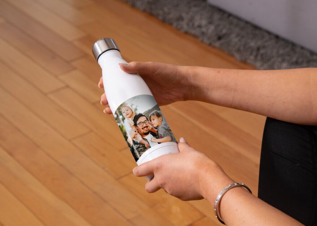 Custom water bottle with family photos will make your kid smile when they use it at school.