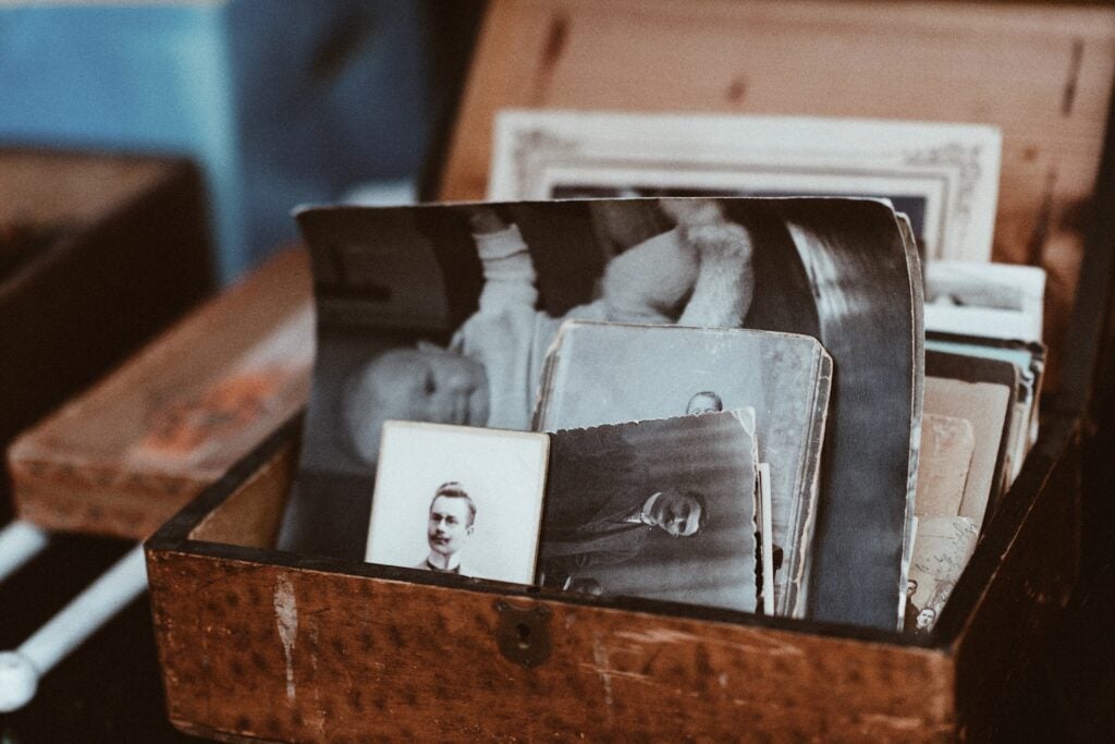 This box of old developed photos inspired a great photo gift idea: scan old photos and print them in a photo book!