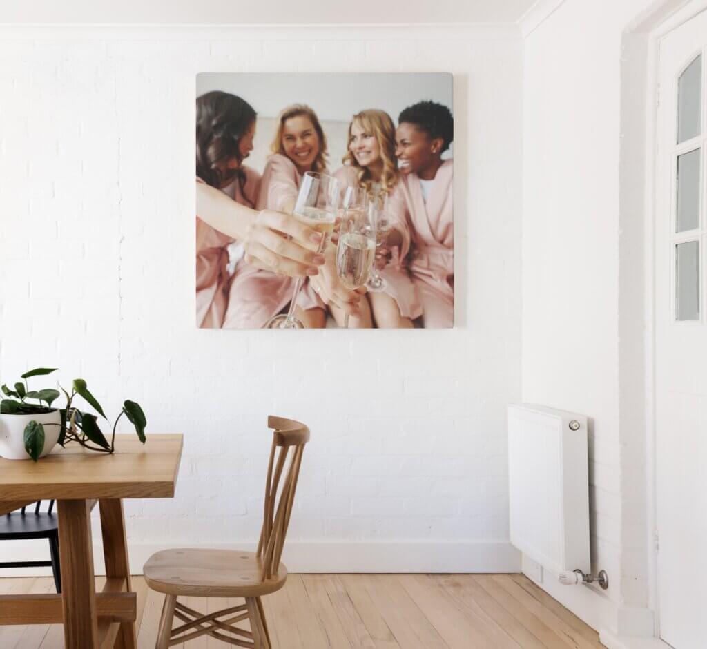 A bridal party photograph hangs in the kitchen as canvas wall decor.
