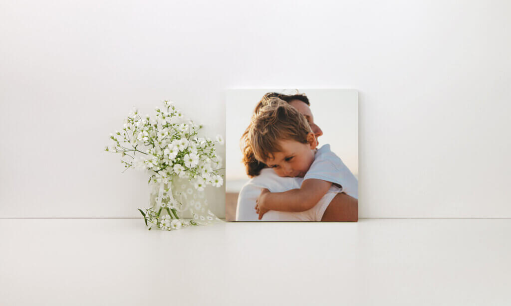 A premium canvas print of mother and son decorates child's nursery, showing that the best nursery canvas prints are timeless.