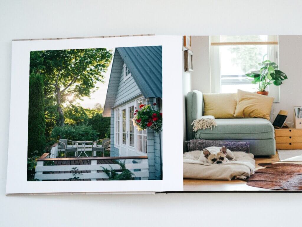 Custom photo book showcasing photos of a home.