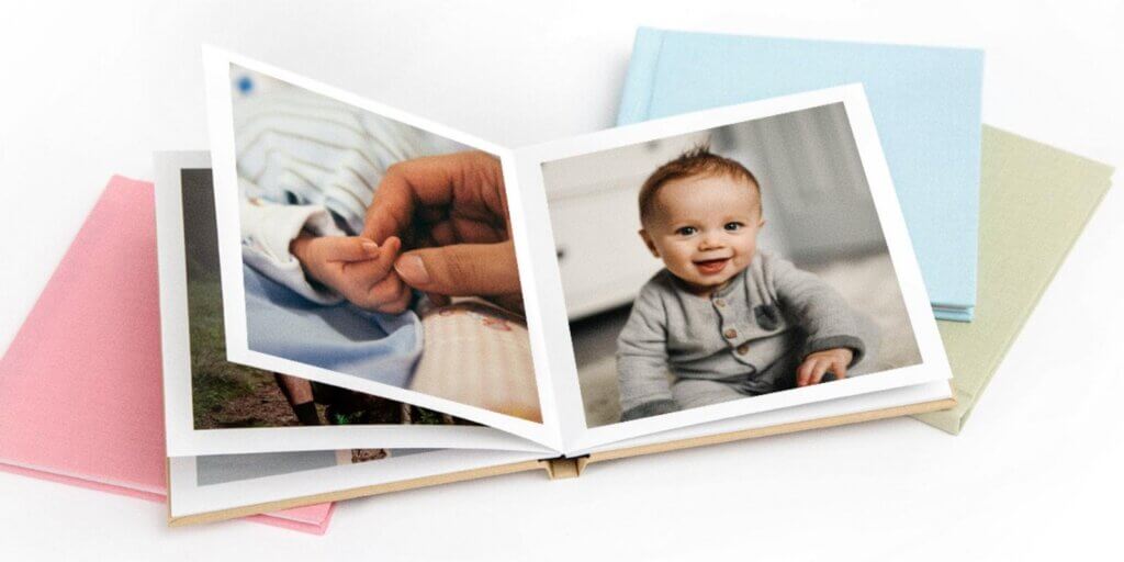 An adorable baby photo and sweet moment between Mom and baby is displayed in this baby photo book.