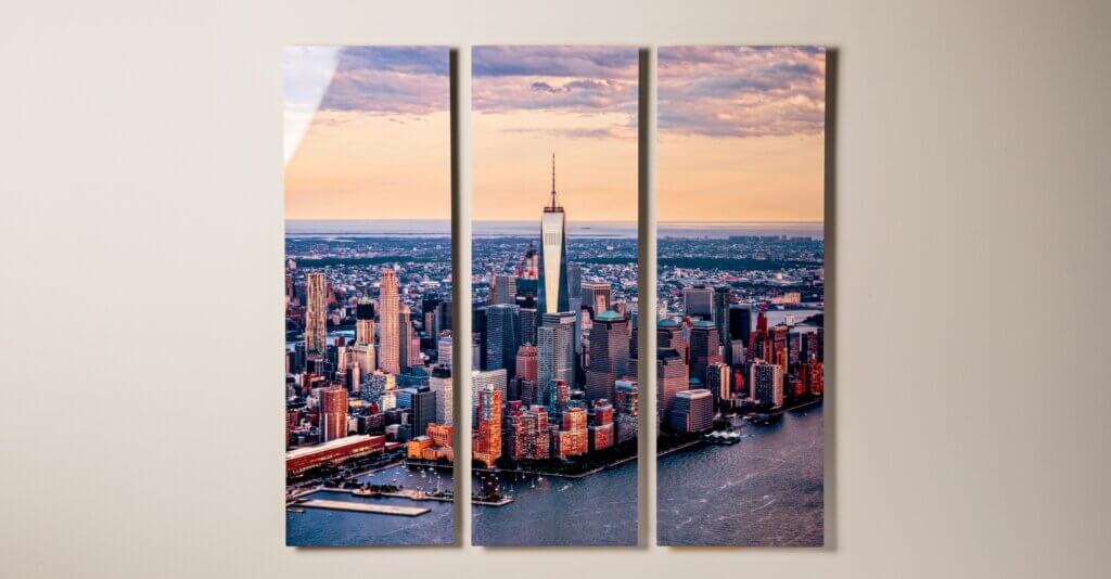 A view of the New York City skyline is printed on a split metal print display.