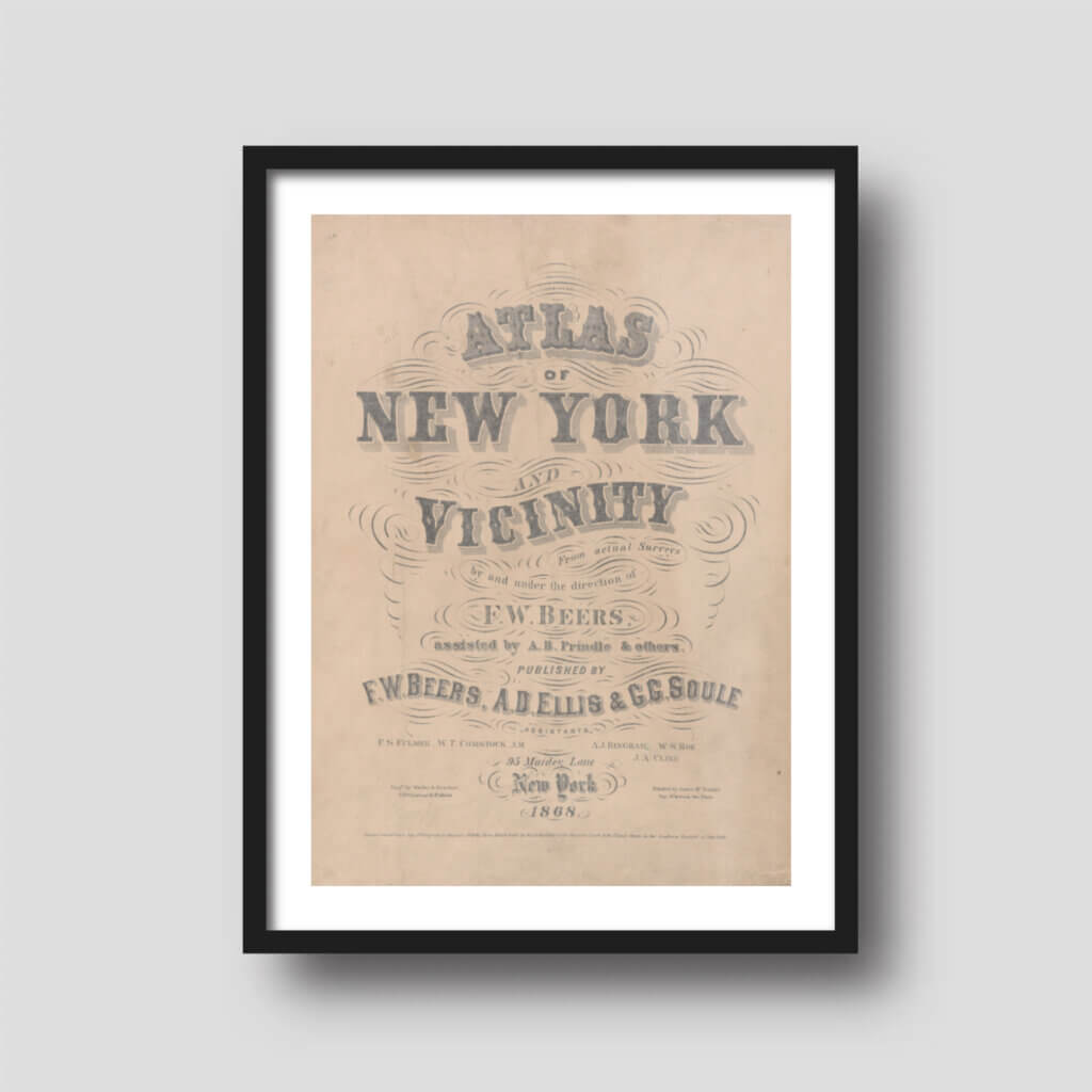 Free printable art from the cover of a New York City atlas, displayed on a framed print.