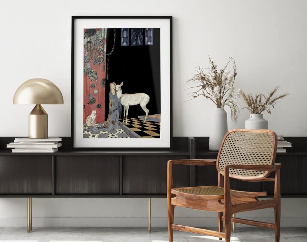 A free printable art piece from the public domain is displayed in a frame on the counter of an aesthetic room. 
