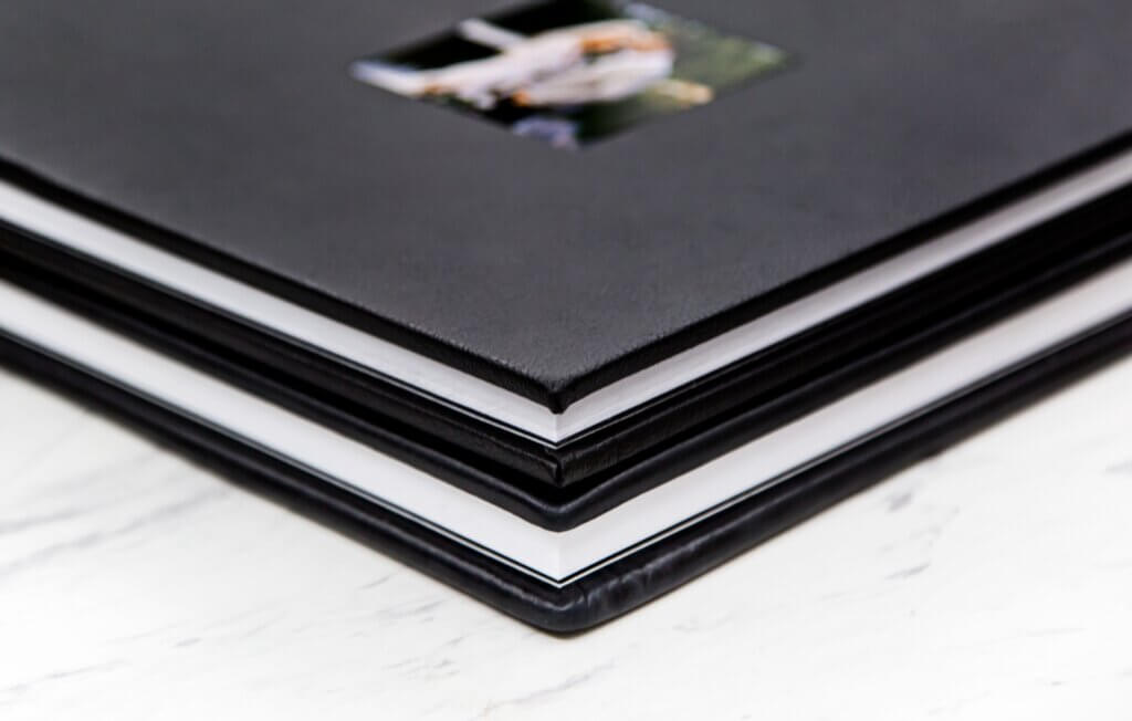 The thick pages and durable cover of a leather custom photo album showcased up close.
